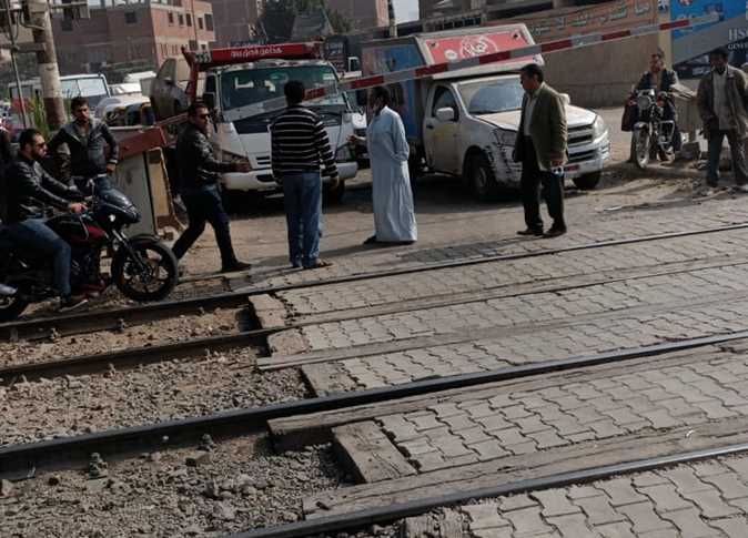 مصرع سيدة تحت عجلات القطار بمزلقان الحواصلية في المنيا